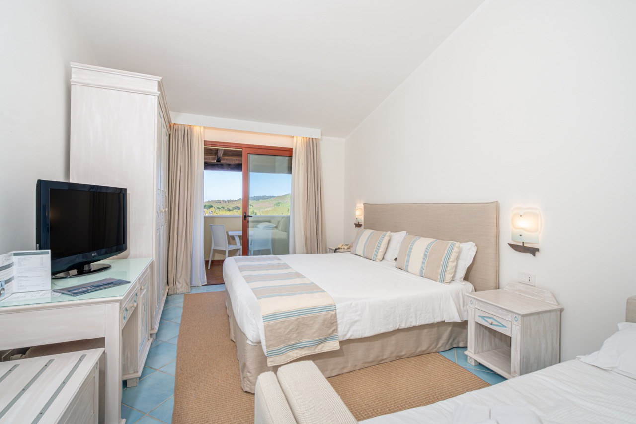 Superior room with balcony at Hotel Sa Pedra, Sardinia